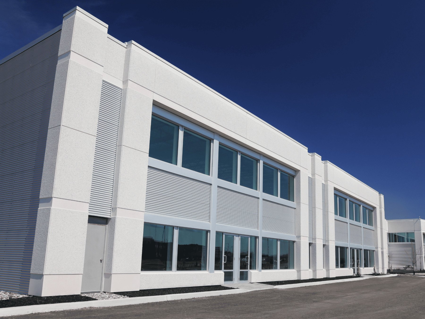 Stock White Exterior of Commercial Building