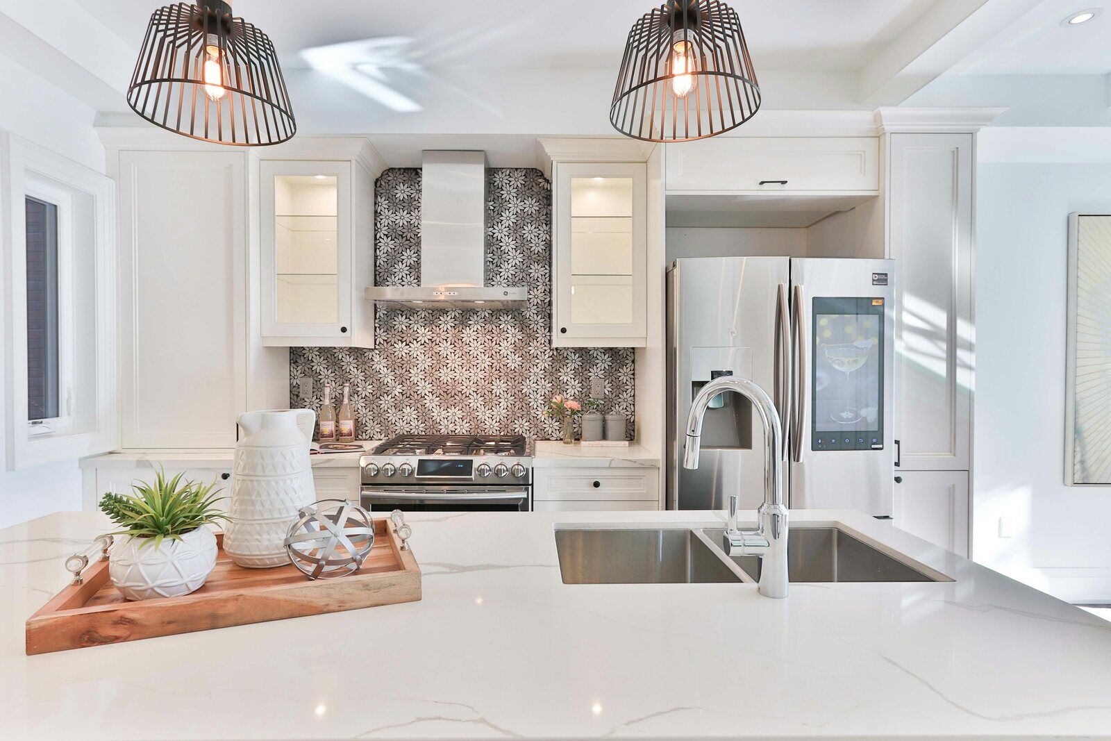 Modern kitchen remodel featuring white cabinetry and patterned backsplash - How Do You Know When It’s Time for a Kitchen Remodel- Wolfe Construction Co - West Tennessee - Home Builder & Remodeler