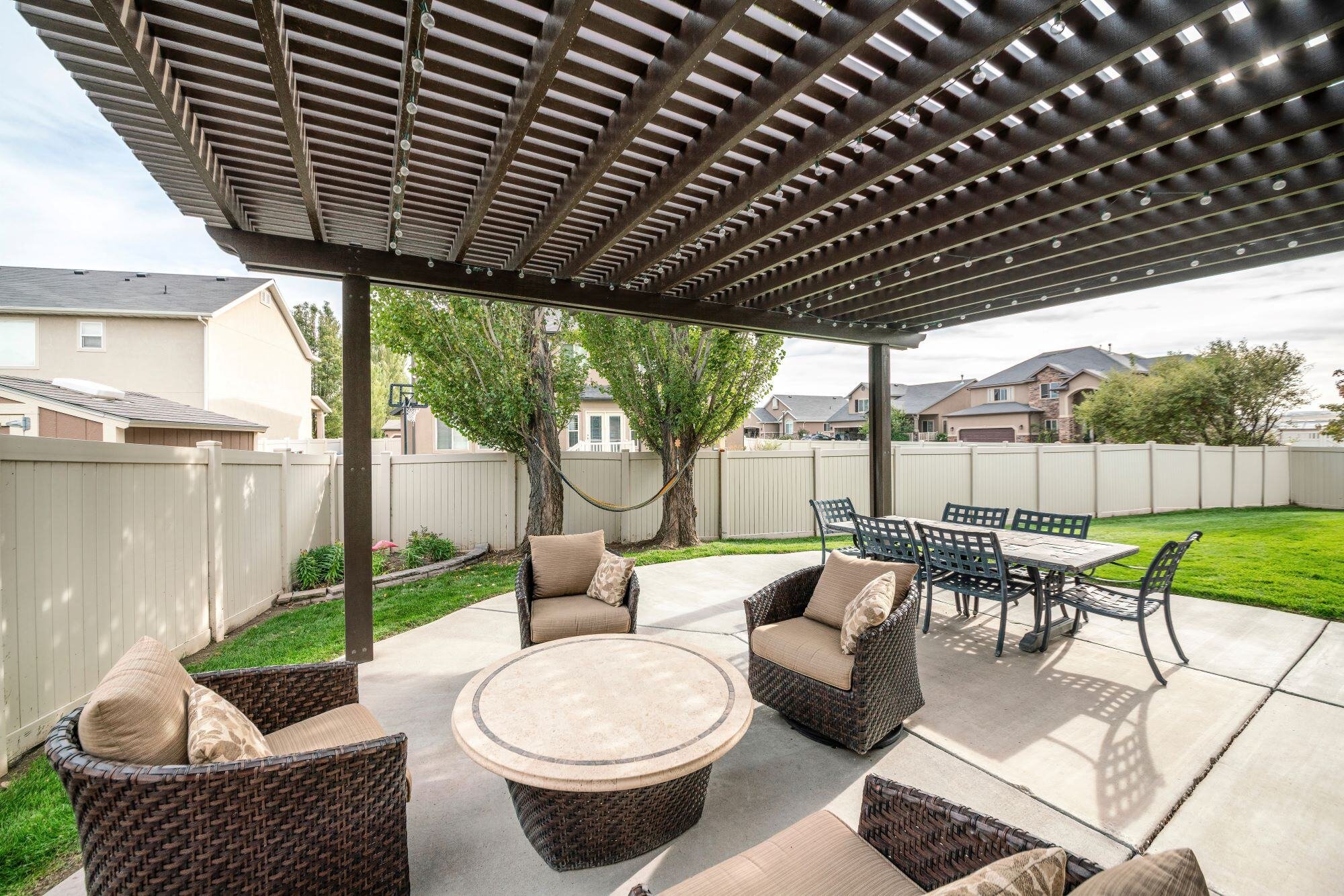 Backyard Outdoor Living Area with Pergola - The Home Remodeling Process & Timeline - Wolfe Construction Co - West Tennessee - Home Builder & Remode