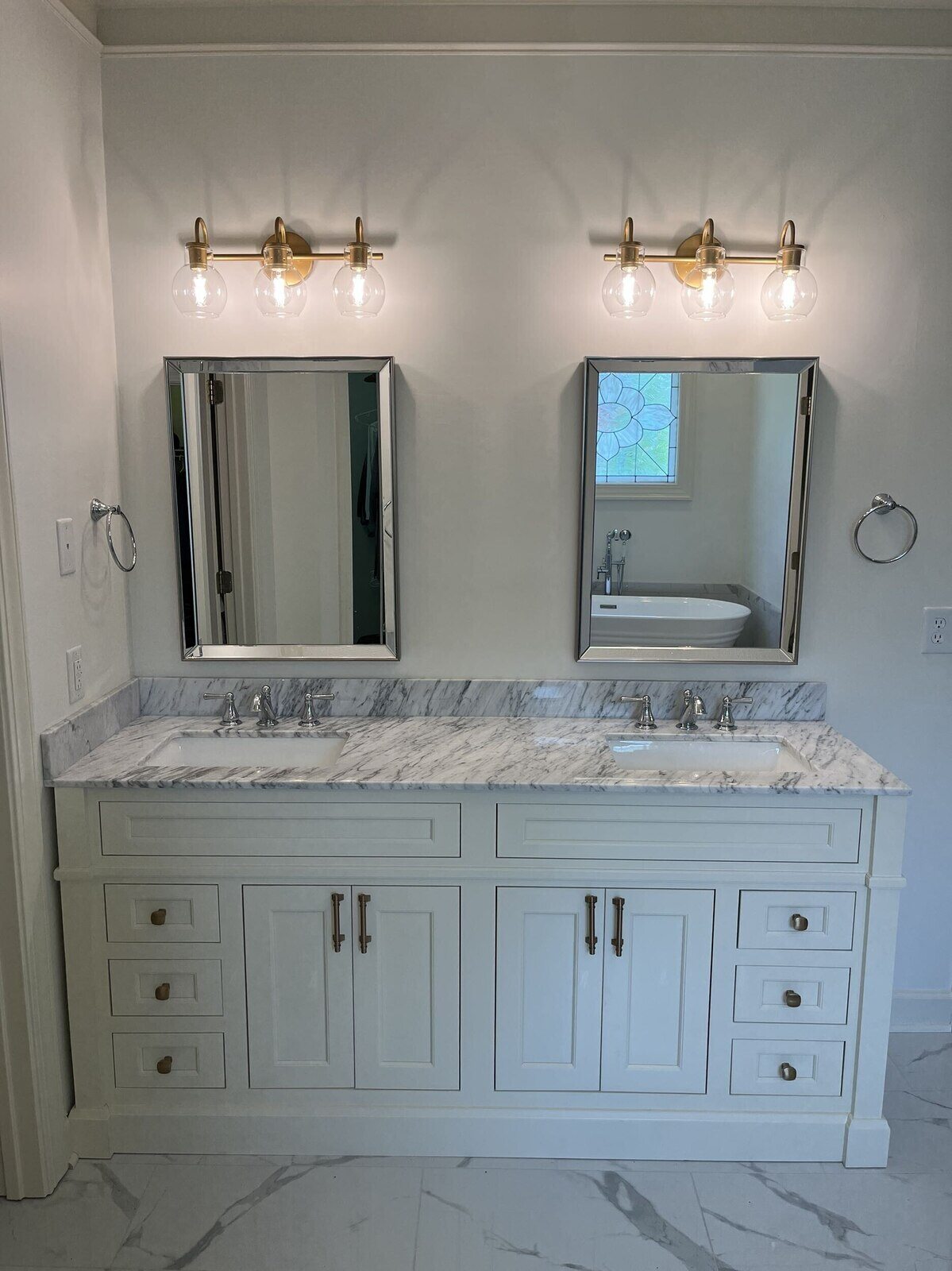 West Tennessee-Bathroom Remodeling Company- Wolfe Construction Co.-Dual sink bathroom vanity with marble countertops by Wolfe Construction in Jackson, TN