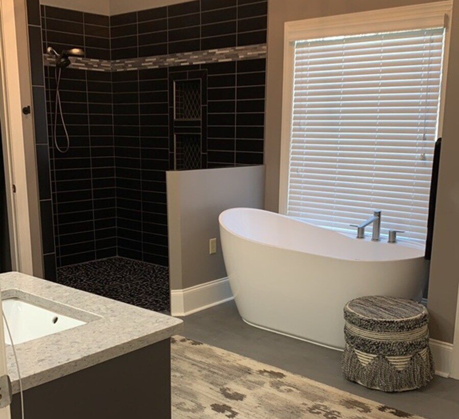 West Tennessee-Bathroom Remodeling Company- Wolfe Construction Co.-Elegant bathroom with a freestanding tub and dark tiled walk-in shower by Wolfe Construction in Jackson, TN